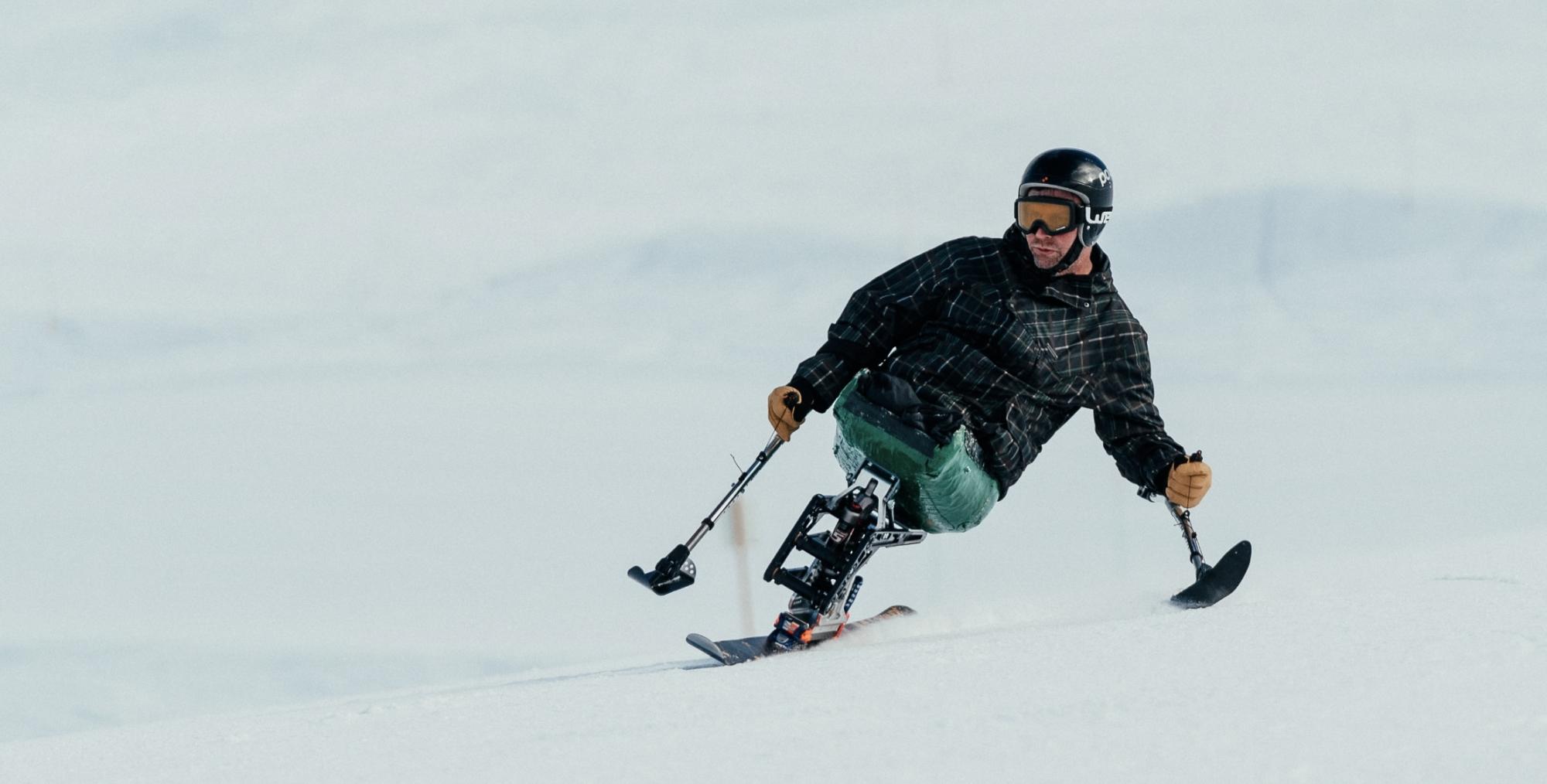 Amputee Afghan veteran skiing as part of a respite break