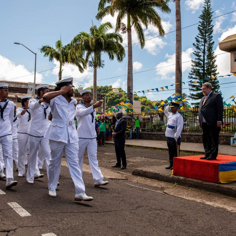 Royal Navy sailors parading past the prime minister Ralph Gonsalves