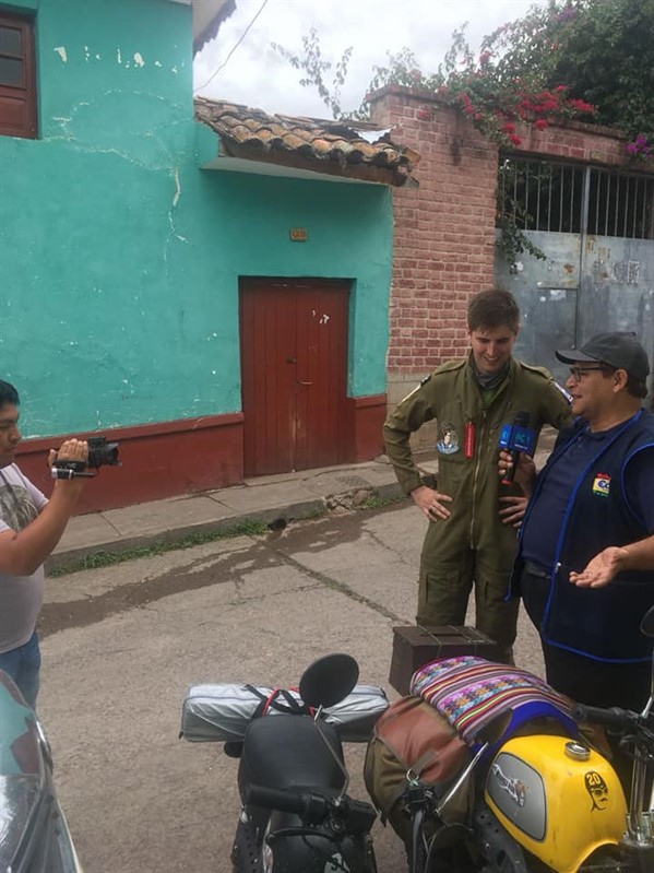 speaking to locals in peru