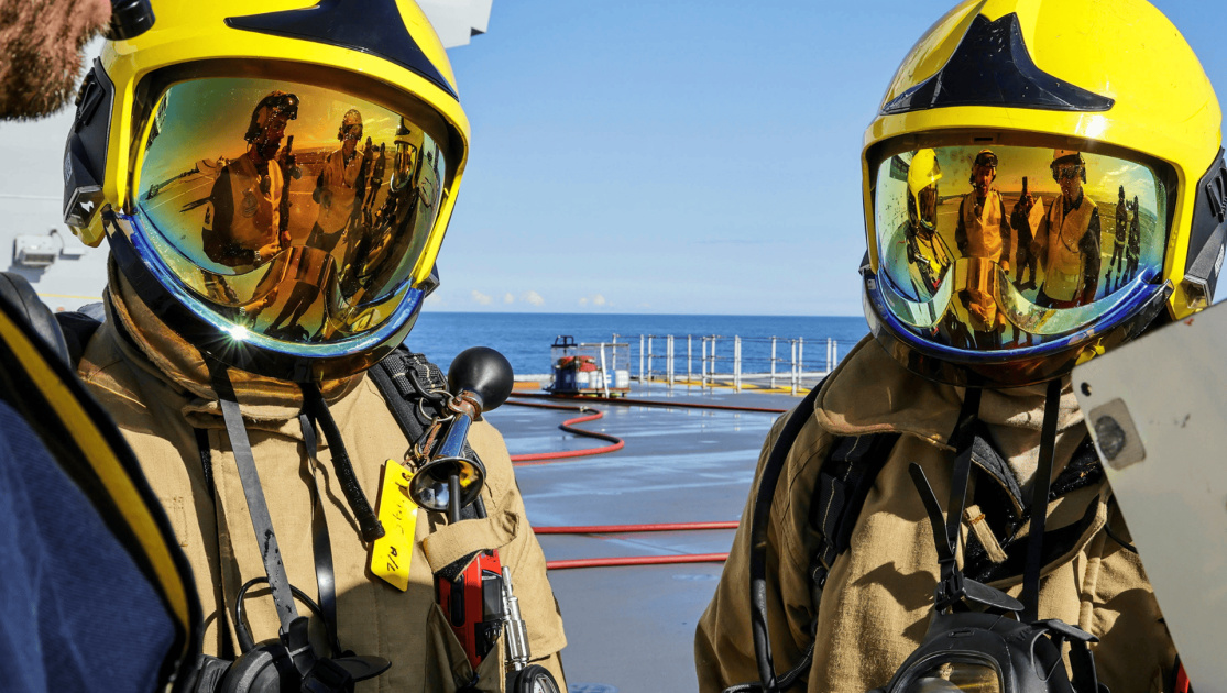 2 Fire fighters on a ship