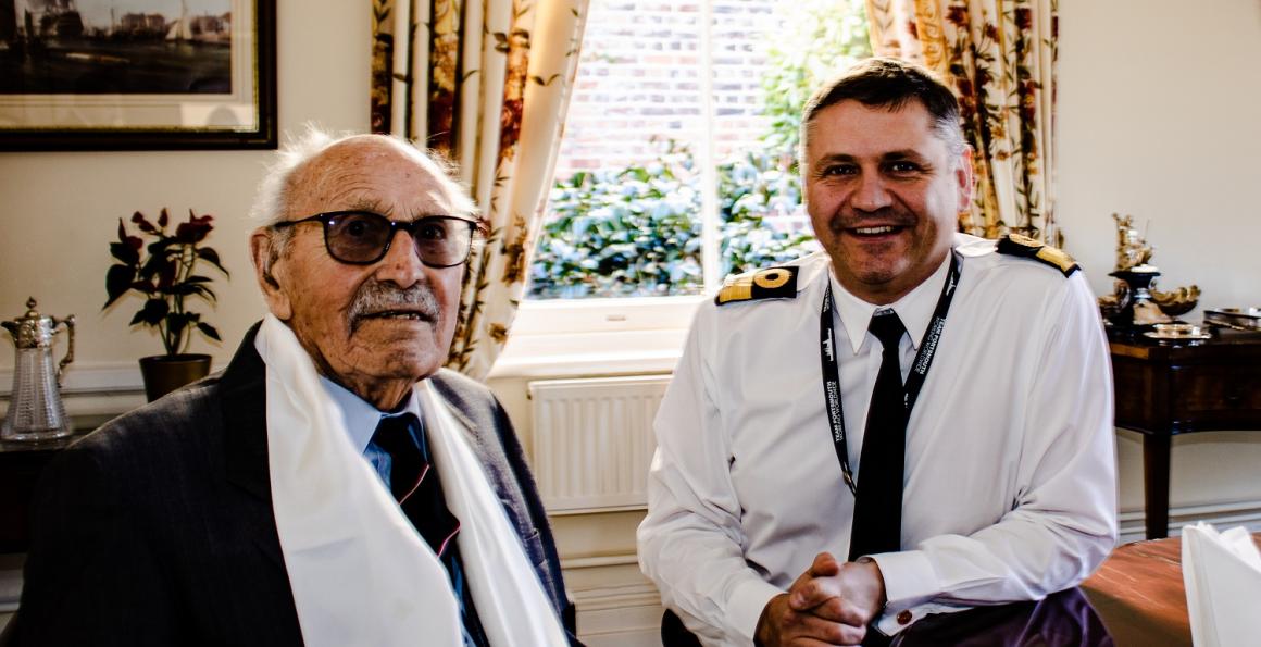 WW2 veteran Roy Harland with Portsmouth Naval Base Commander, Cdre Jeremy Bailey. 
