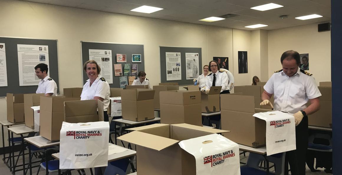 The boxes being packed and prepared for distribution at the Institute of Naval Medicine