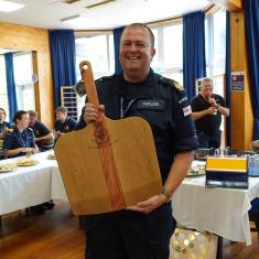 Michale Taylor holding a presented cheeseboard