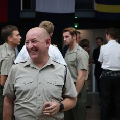men smiling and networking in forces uniform