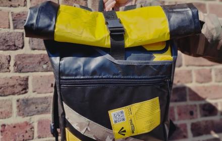 yellow and black bag with camo strap and RNRMC and Oarsome chance feature