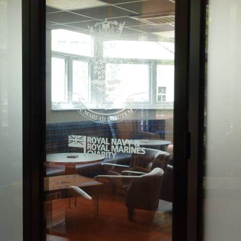 Decal of INM and RNRMC on a window