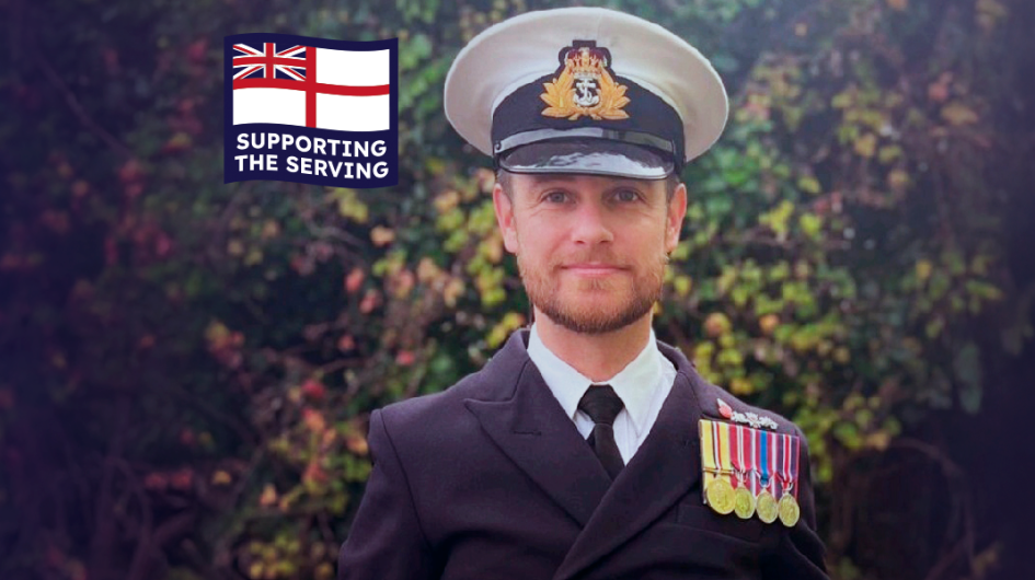 Man in Naval Uniform looking directly into the camera