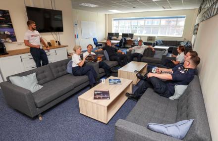 Group of  Senior Engineering trainees at HMS Sultan relaxing in a lounge area, conversing.