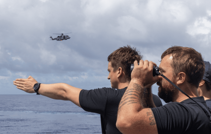 Sailors assisting a rescue